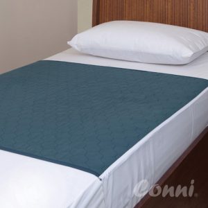 Conni Bed Pad with Tuck-ins - Teal Blue