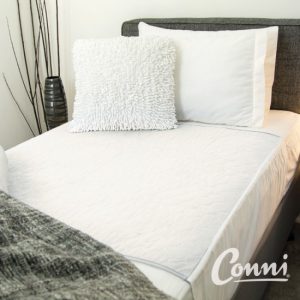Conni Bed Pad with Tuck-ins - White